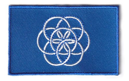 Earth flag patch, blue with white interlocking circles, size 6.5 x 4 cm.