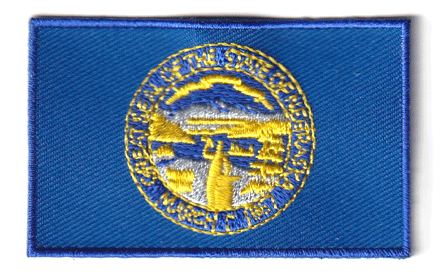 Nebraska flag patch, 6.5 x 4 cm, embroidered design.
