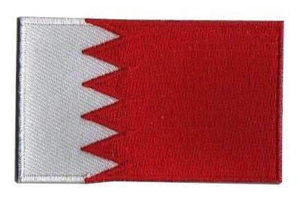 Bahrain flag patch with red base and white serrated stripe, size 6.5 x 4 cm.