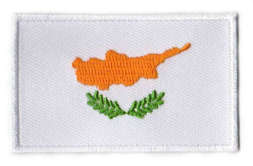 Cyprus flag patch with golden island map and green olive branches on white background.