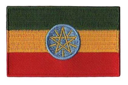 Ethiopia flag patch with green, yellow, red stripes and blue circle emblem, size 6.5 x 4 cm.