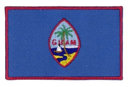 Guam flag patch with blue background, red border, and emblem featuring a proa and palm tree.