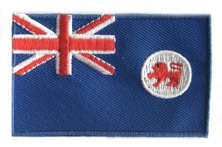 Tasmania flag patch featuring a red lion on a blue background, size 6.5 x 4 cm.