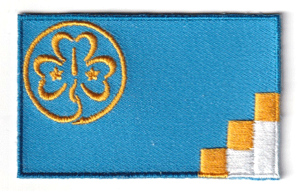 WAGGGS flag patch, 6.5 x 4 cm, World Association of Girl Guides and Girl Scouts.