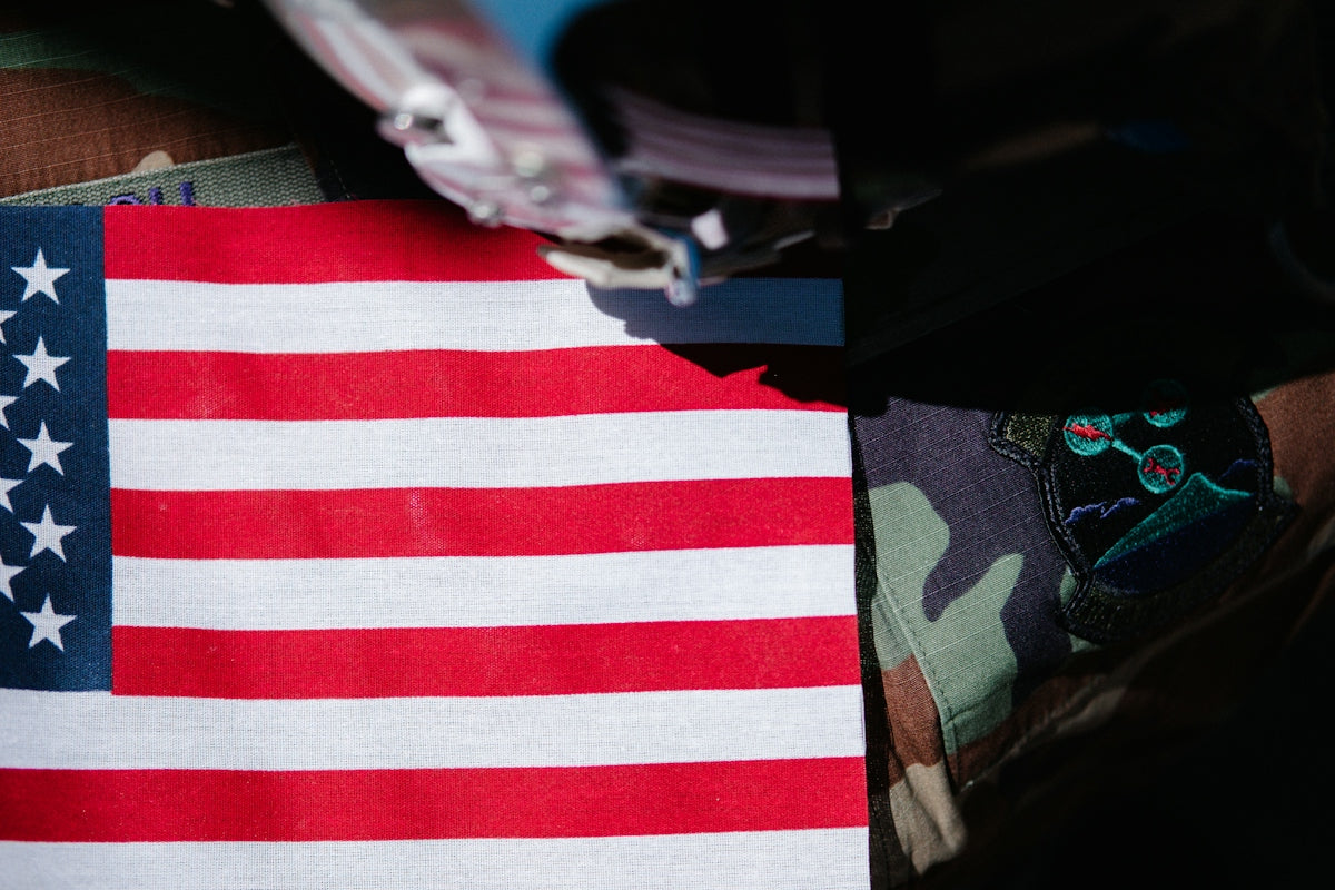 a close up of an american flag on a jacket